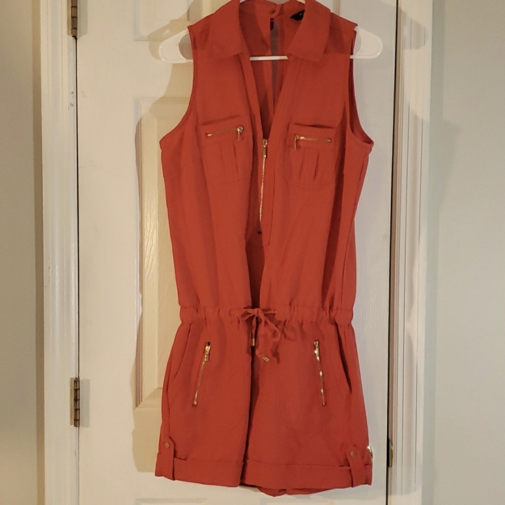 Burnt orange dressy romper with gold hardware  size 8